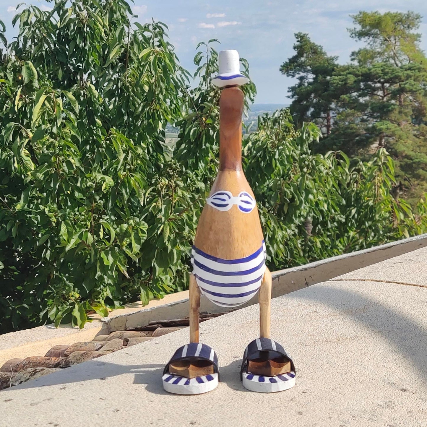 Canard baigneuse avec sandale en bois